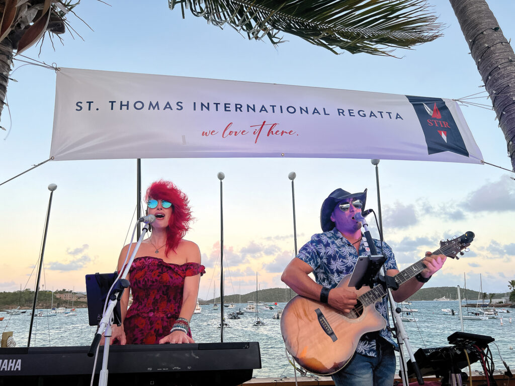Musicians playing at the St. Thomas YC