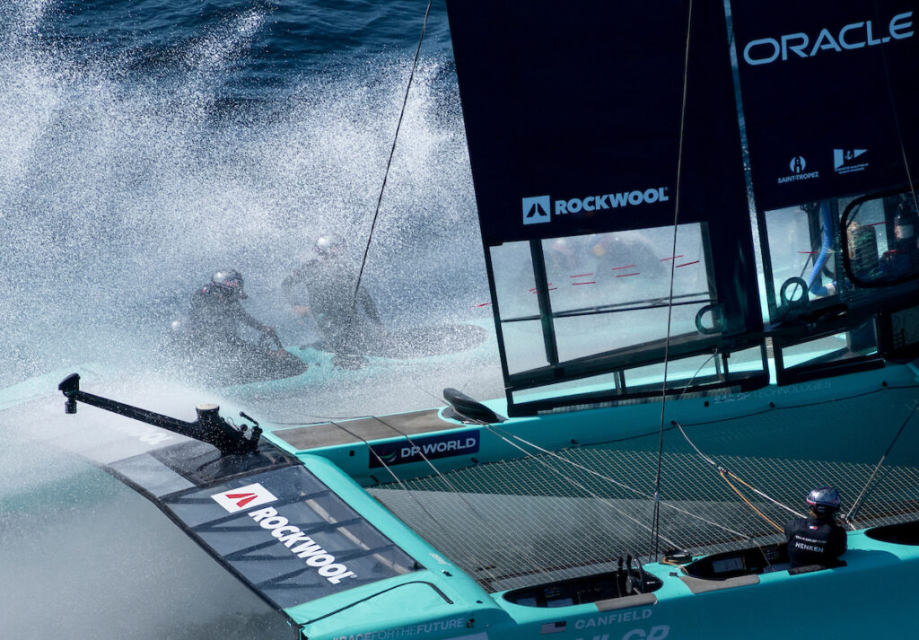 USA SailGP Team hit a wave